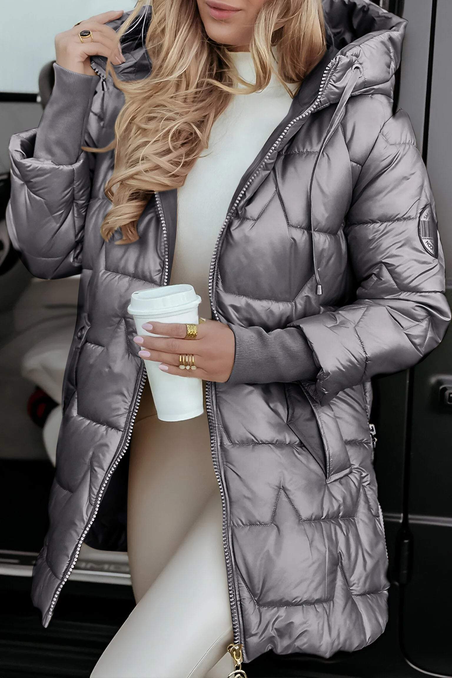 Women's black hooded puffer coat mid-thigh length with synthetic fill lightweight warmth
