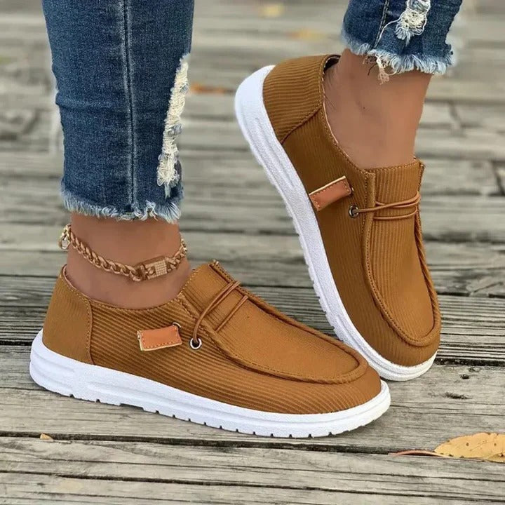 Women's slip-on hiking boots in neutral tones, laceless outdoor design with cushioned all-day comfort