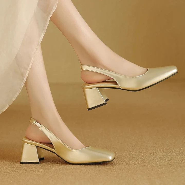 Women's faux leather slingback block heel pumps in neutral tone with secure ankle strap, day-to-night style