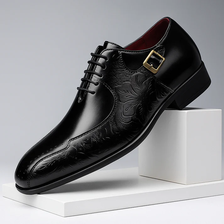 Men's black polished leather Oxford shoes with dual lace buckle and engraved detailing