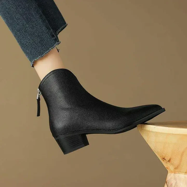 Women's black genuine leather ankle boots with pointed toe and sculpted block heel, Parisian-inspired style