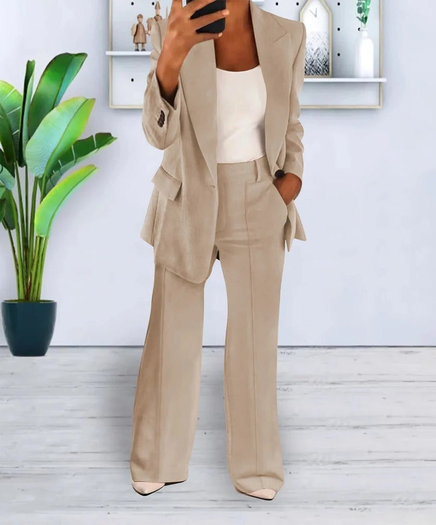 Women two-piece structured jacket top and matching trousers set, clean professional silhouette everyday wear