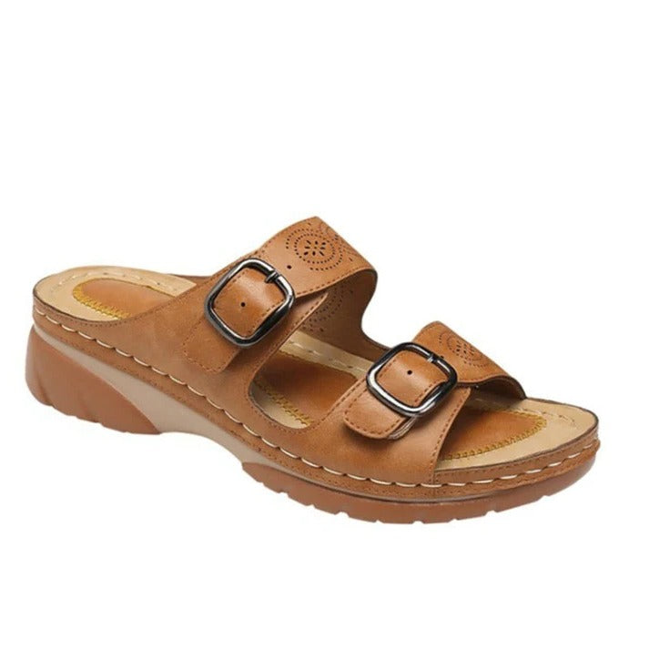 Women's beige orthopedic sandals with adjustable double buckle straps and cushioned arch support footbed