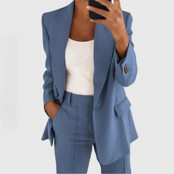 Women's tailored blazer and pants set in structured fit, polished coordinated professional look