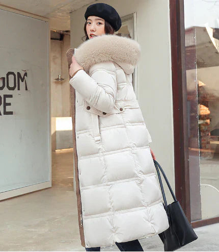 Women's hooded winter coat in warm tones, stylish sustainable outerwear with elegant fitted silhouette