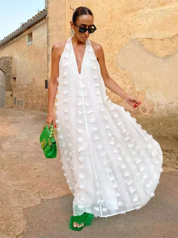 Elegant white halter neck maxi dress with 3D floral appliqués, A-line silhouette for formal occasions