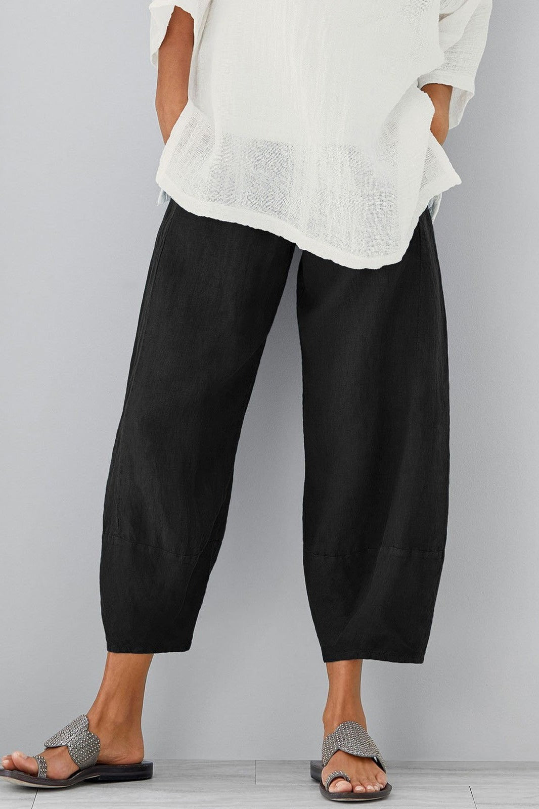 Women's casual loose wide-leg pants with pockets, high-rise elastic waist, relaxed everyday style