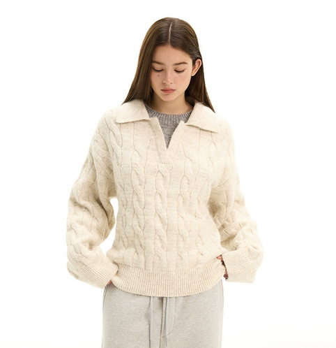 Men's cream cable knit relaxed-fit sweater with soft open collar and ribbed cuffs