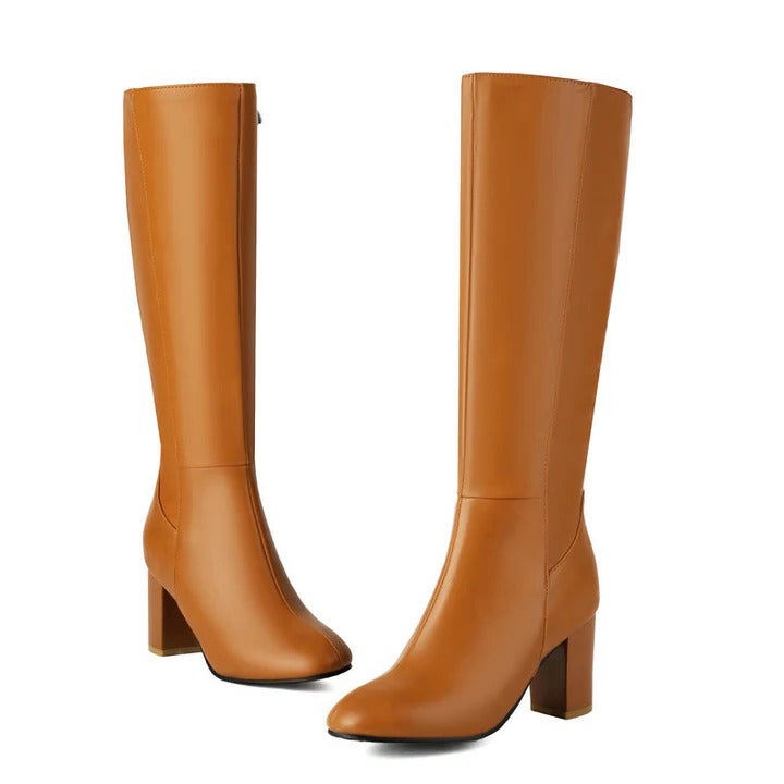 Women's tall knee-high winter boots sleek silhouette with functional side zipper for cold weather