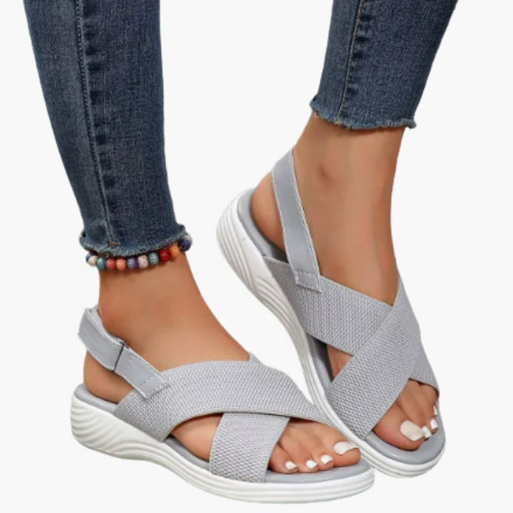 Women's breathable open-toe sandals in neutral tones with adjustable straps for everyday comfort and travel