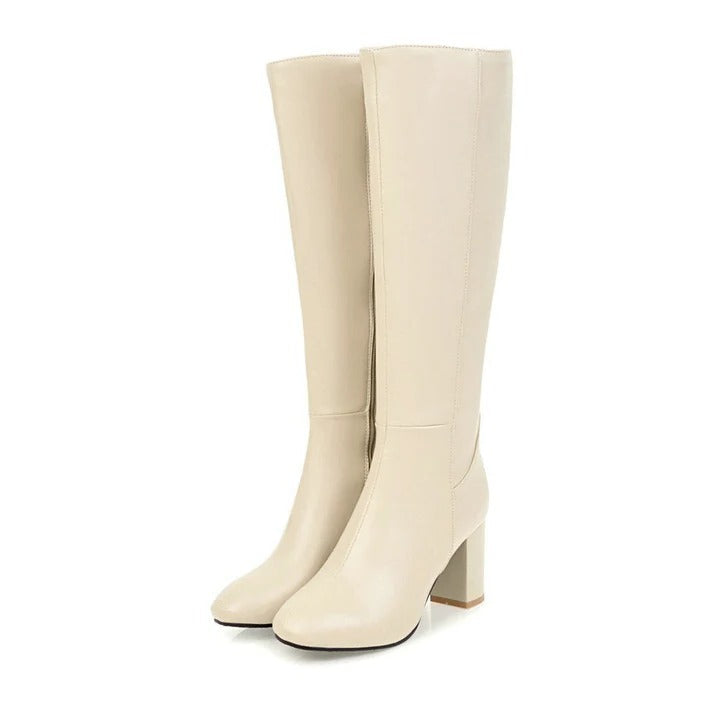 Women's tall knee-high winter boots with sleek silhouette, side zipper, designed for warmth and all-day comfort