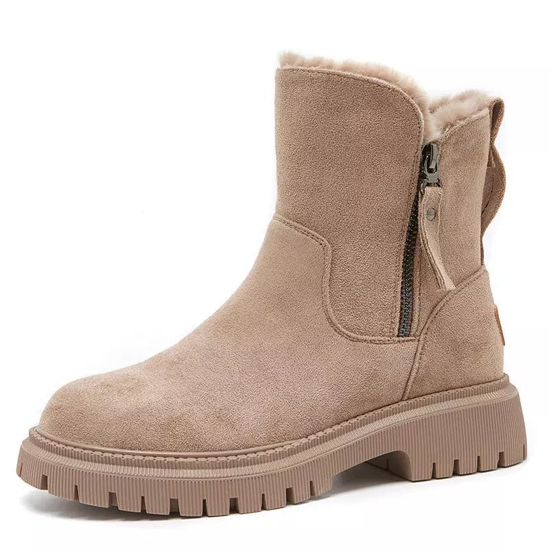 Casual slip-on winter boots with textile shaft, warm lace-free design for cold-weather commuters