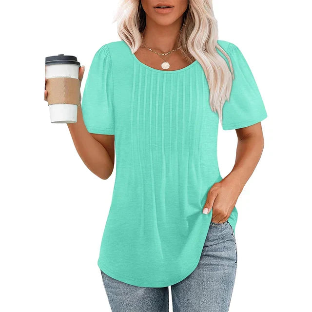 Women's lightweight white pleated blouse with soft crew neckline, airy silhouette for everyday chic style