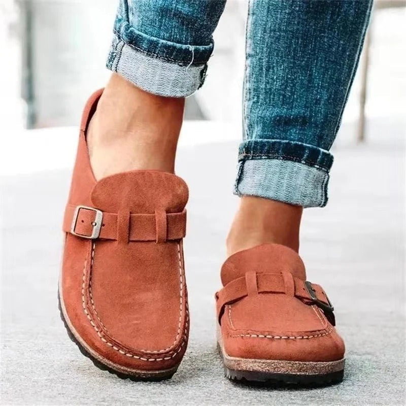 Women's retro slip-on comfort sandals in neutral tones with cushioned supportive sole for all-day wear