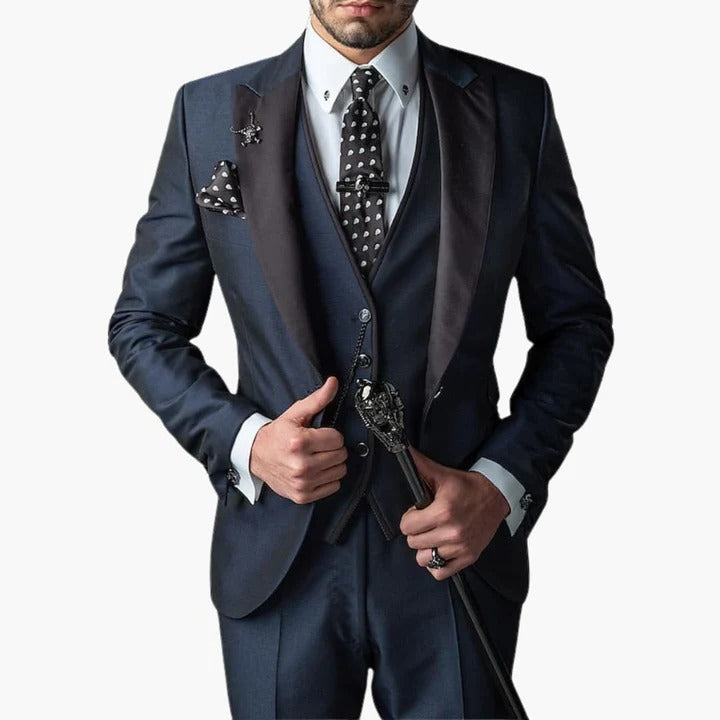 Men's burgundy three-piece tailored suit with black lapels, vest included, perfect for weddings