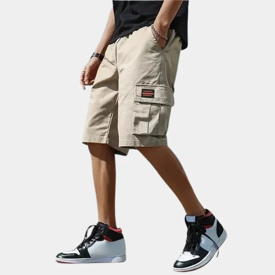 Men's khaki relaxed-fit cargo shorts knee-length with multi-pocket utility design for outdoor travel