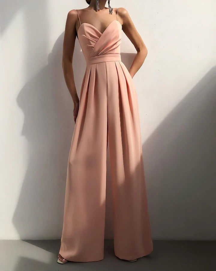 Women's sleeveless jumpsuit shaped waist structured silhouette clean neckline elegant everyday style