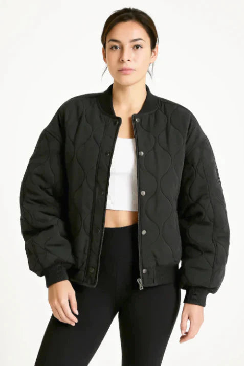 Women's oversized quilted hip-length bomber jacket casual warm relaxed silhouette with quilted texture