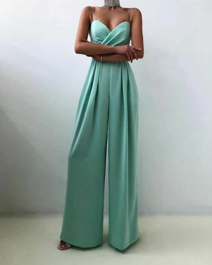 Women's sleeveless jumpsuit shaped waist structured silhouette clean neckline elegant everyday style