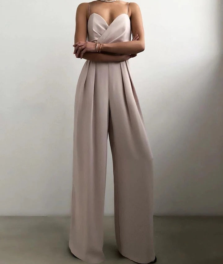 Women's sleeveless jumpsuit shaped waist structured silhouette clean neckline elegant everyday versatile