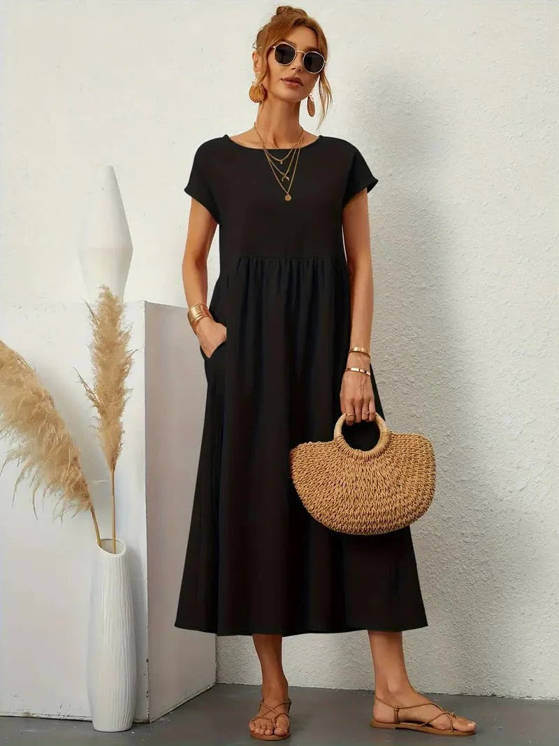 Elegant women's navy midi dress with regular fit, functional side pockets, and refined everyday versatility