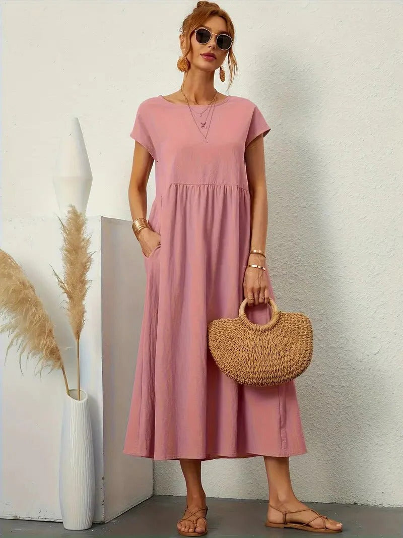 Elegant women's midi dress with pockets, refined everyday style in versatile cut for casual to formal wear