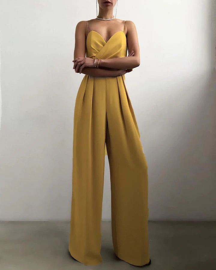 Women's sleeveless jumpsuit shaped waist structured silhouette clean neckline elegant everyday style