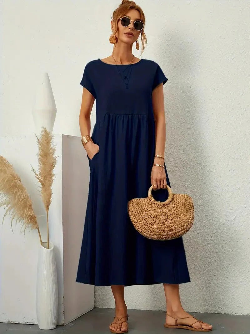 Elegant women's midi dress with pockets, refined regular fit, versatile everyday style in neutral tones