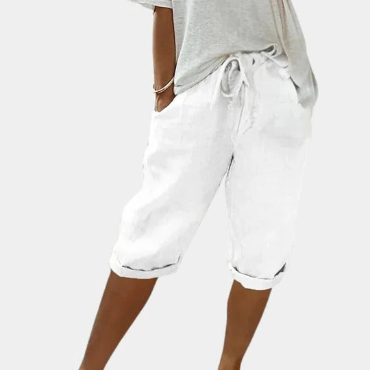 Women's casual elastic waistband shorts with side pockets, mid-thigh length, lightweight breathable fabric