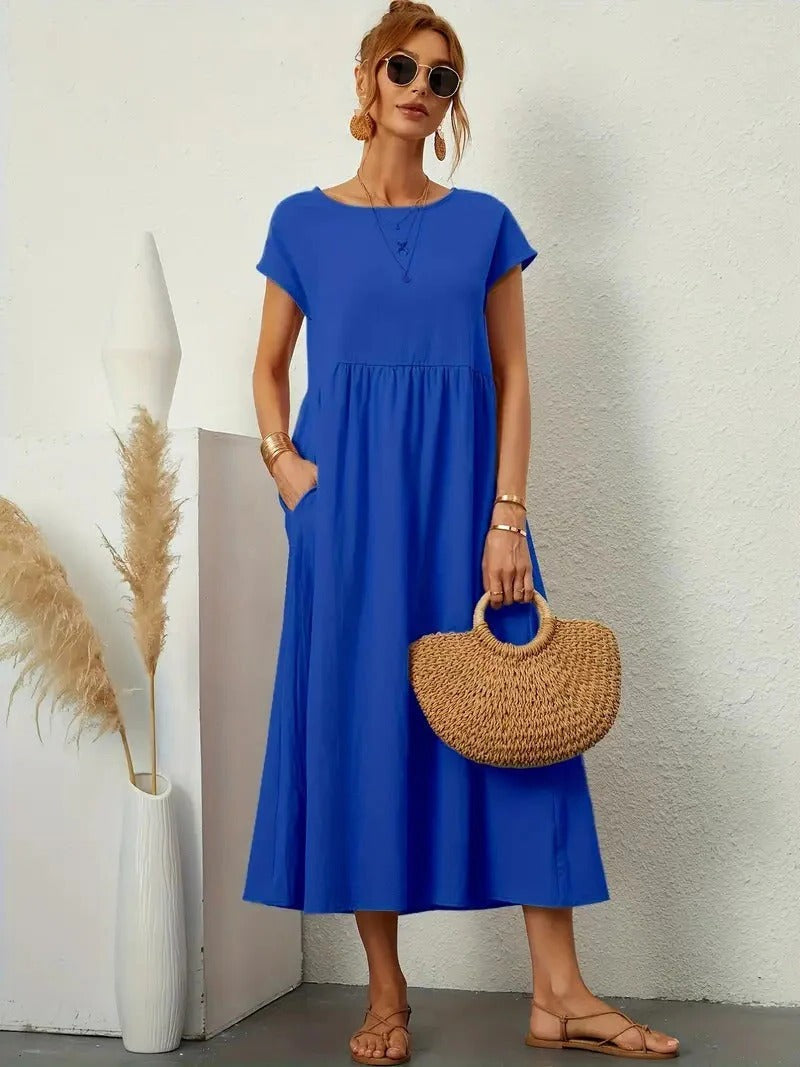 Elegant women's midi dress with pockets, refined everyday style in versatile classic cut