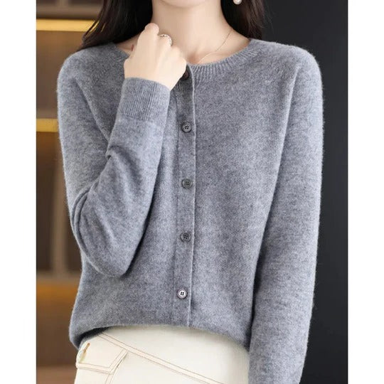 Women's cozy V-neck cardigan sweater with front buttons, long sleeves, minimal silhouette for layering