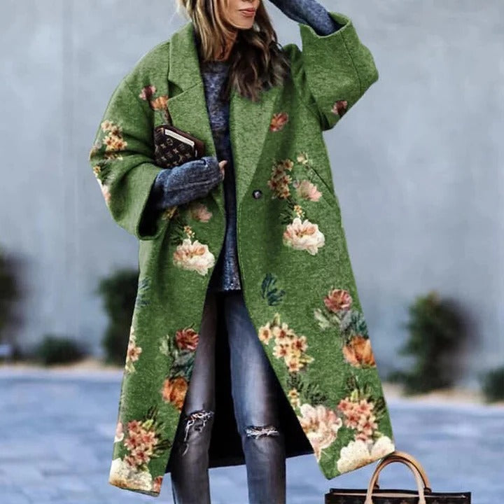 Printed long coat with subtle pattern, structured silhouette, button closure, layering-friendly cold weather outerwear