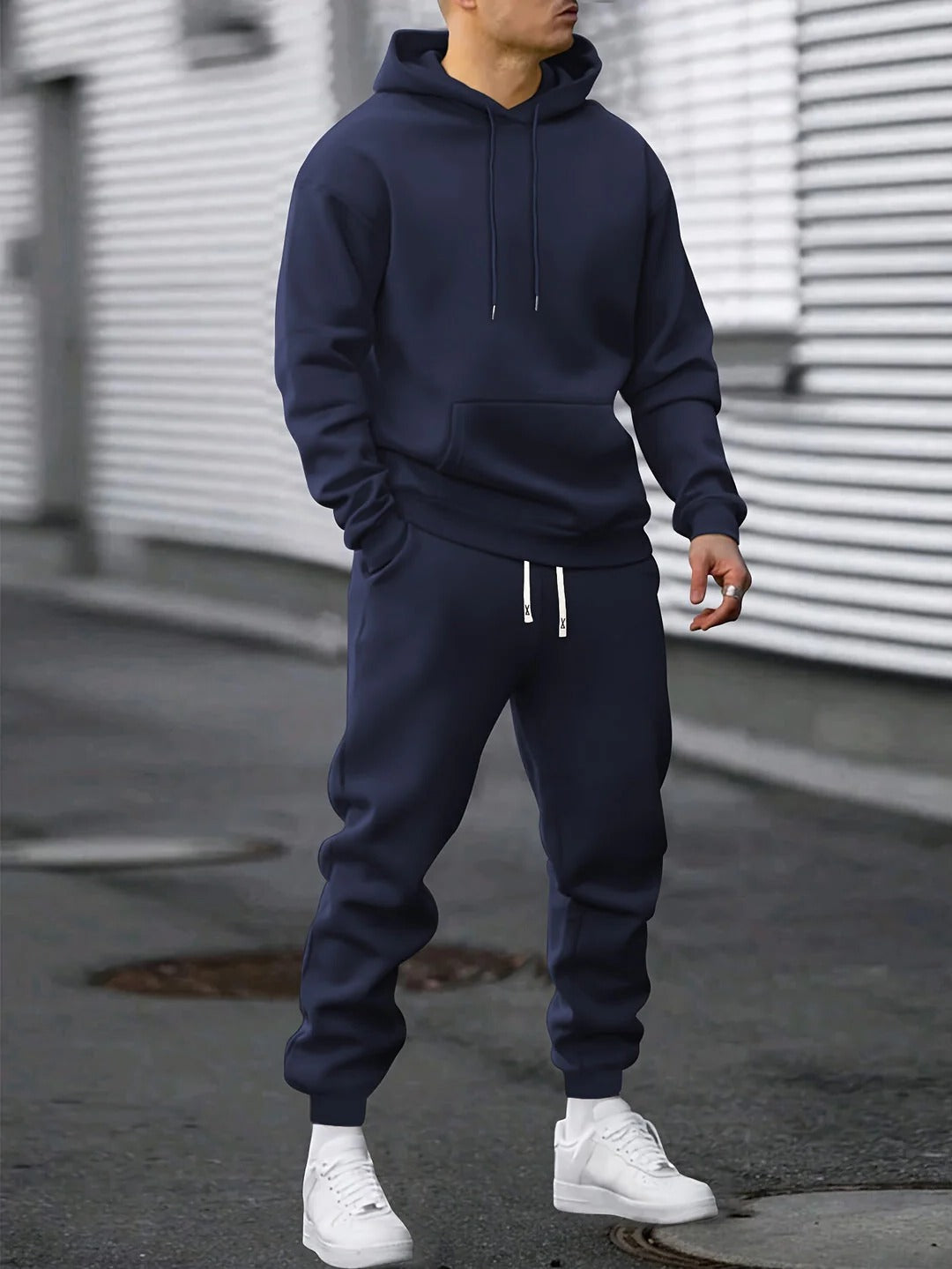 Men's gray fleece hoodie and jogger matching tracksuit set with relaxed fit for workout and lounge