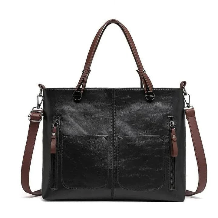 Black premium leather handbag minimalist structured design with refined finish for professionals