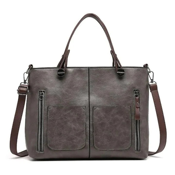 Urbann Vibe black minimalist leather handbag structured silhouette with premium aged finish for professionals