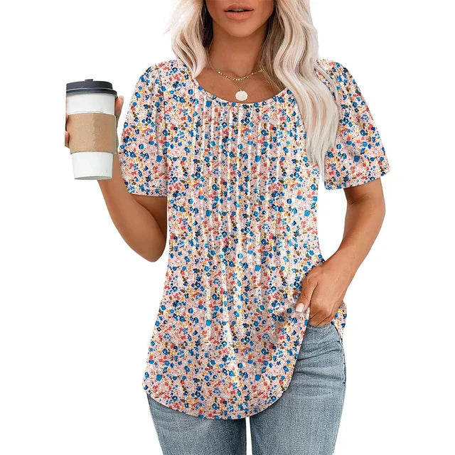 Women's white lightweight pleated summer blouse with soft crew neckline, airy everyday chic silhouette