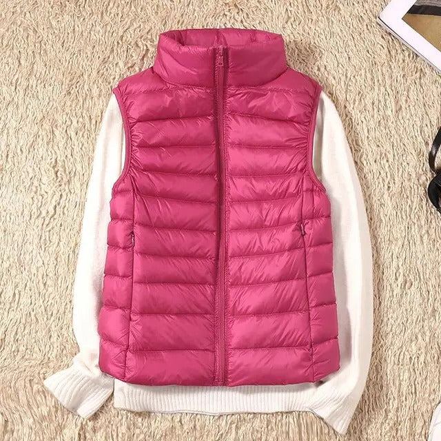Women's ultralight slim vest sleek silhouette warm layering piece no bulk everyday wear