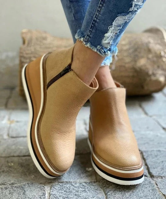 Women's low ankle boots with side zip, structured silhouette, reinforced sole for all-season comfort