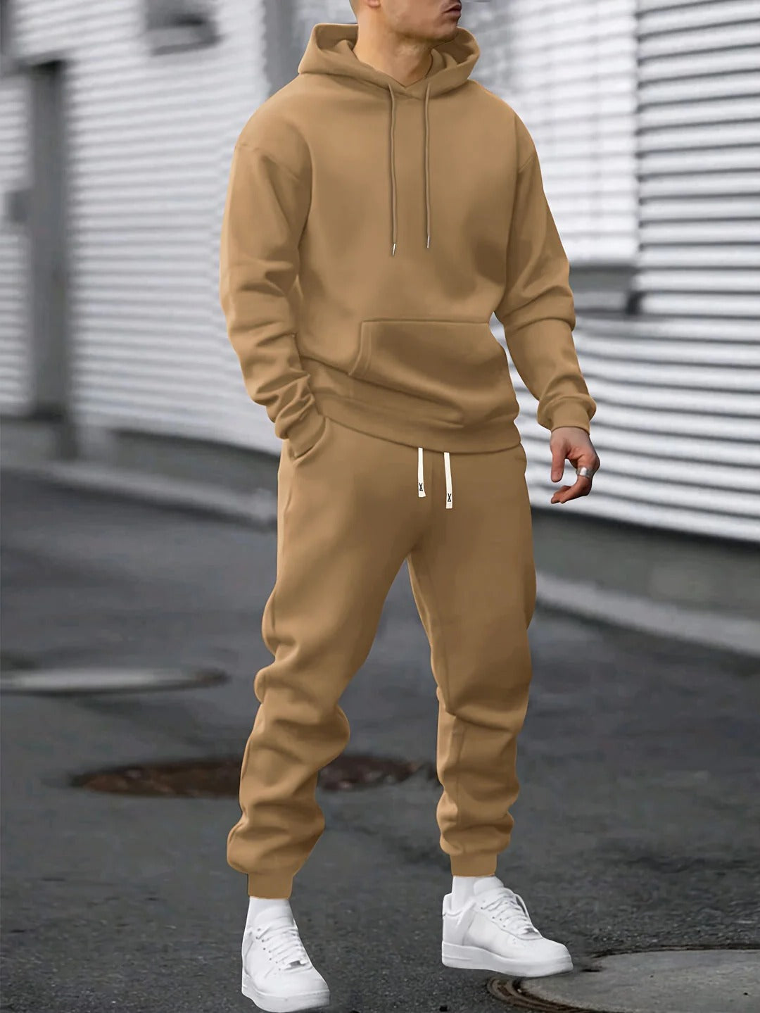 Men's premium fleece hoodie and jogger tracksuit set in solid color, relaxed fit with matching two-piece design