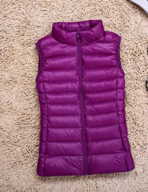 Women's ultralight slim vest sleek silhouette warm layering piece no-bulk everyday wear