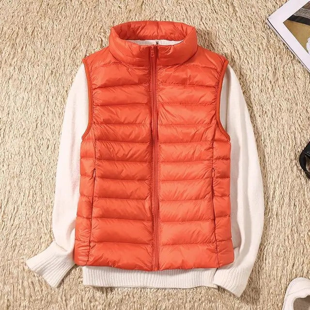 Women's ultralight slim vest sleek silhouette warm layering piece no bulk everyday wear