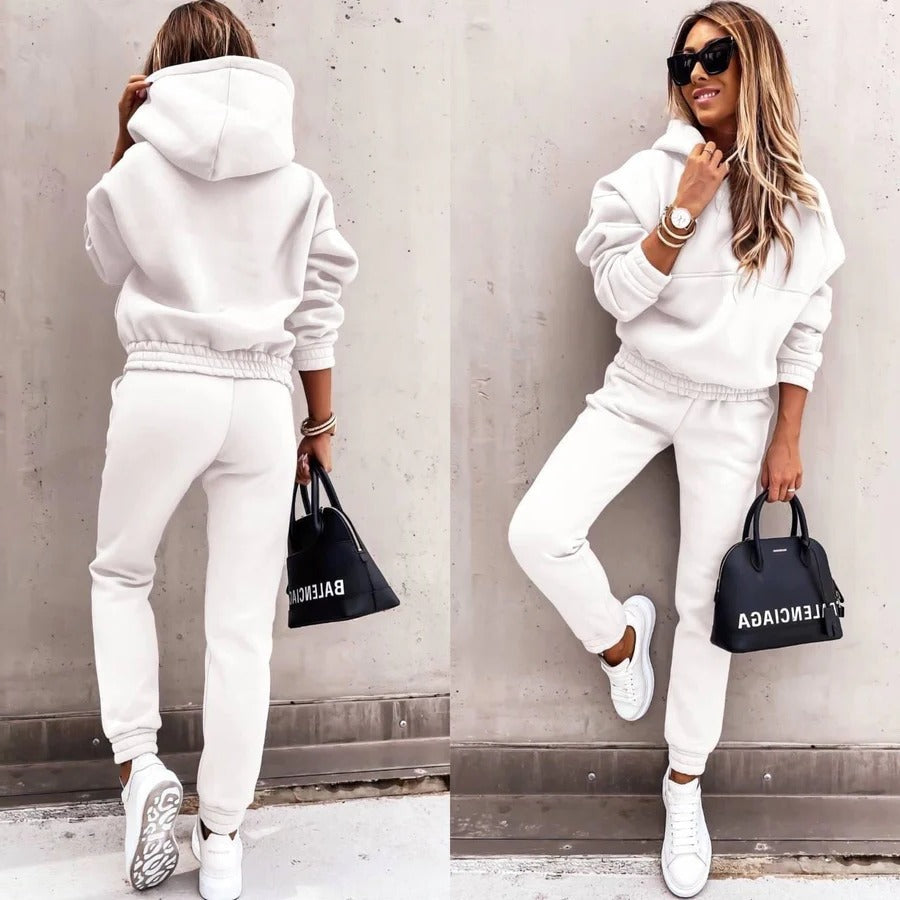 Gray lounge tracksuit set featuring oversized hoodie and slim tapered joggers for relaxed everyday wear