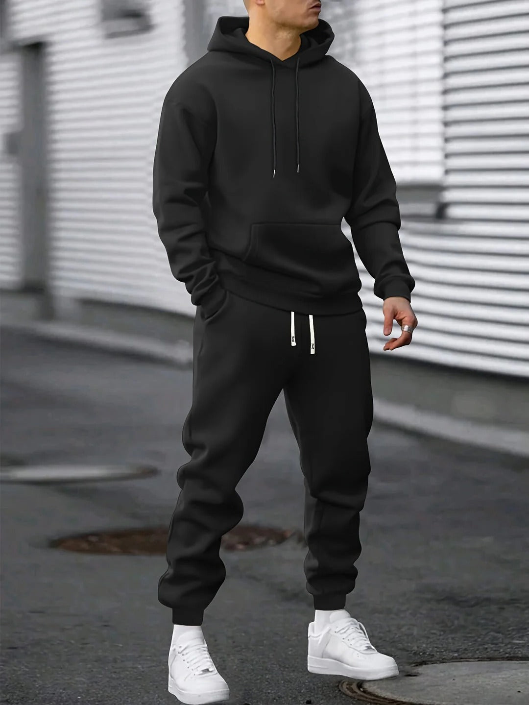 Men's premium fleece hoodie and jogger tracksuit set in solid color with matching two-piece design