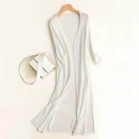 Women's long open-front cardigan in neutral tones, elegant slim silhouette with refined drape for work