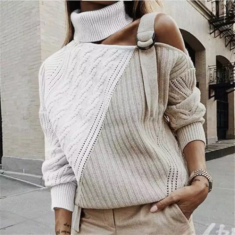 Women's short turtleneck sweater with stand-up collar and button detail, chic minimalist knit top