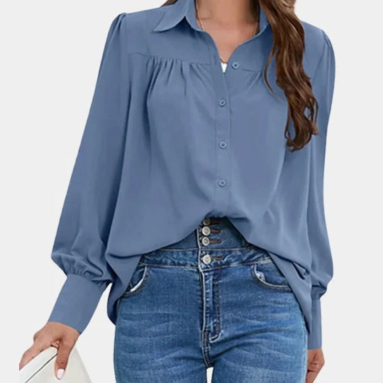 Women's solid color office blouse with shirt collar and dramatic lantern sleeves for professional look