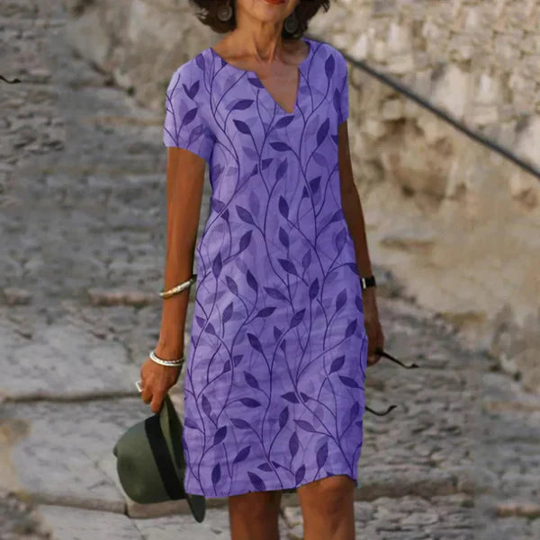 Women's leaf print V-neck short sleeve dress in multicolor botanical pattern, effortless chic everyday style