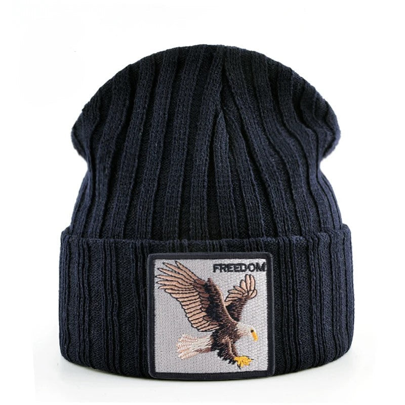 Black stretchy knit beanie with embroidered Predator patches, soft breathable fabric for outdoor style