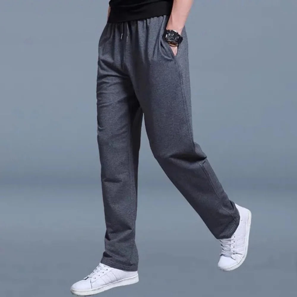 Men's gray cotton-polyester sweatpants relaxed fit with elastic waist and side pockets for all-day comfort