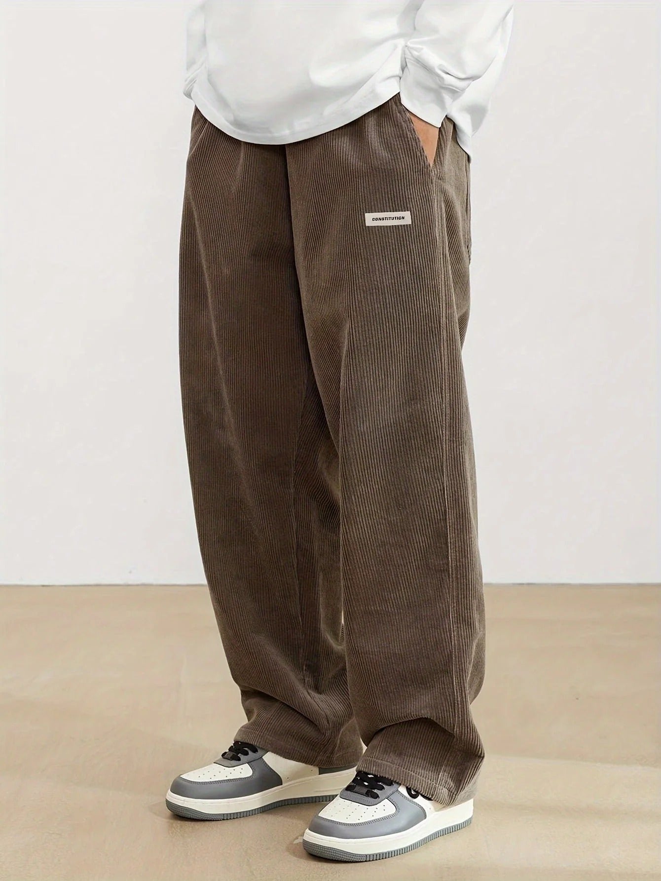 Men's loose fit wide leg corduroy pants with side pockets, casual full length style for everyday comfort